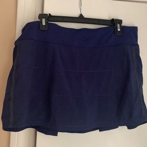 12 Tall. Navy Lululemon tennis skirt.